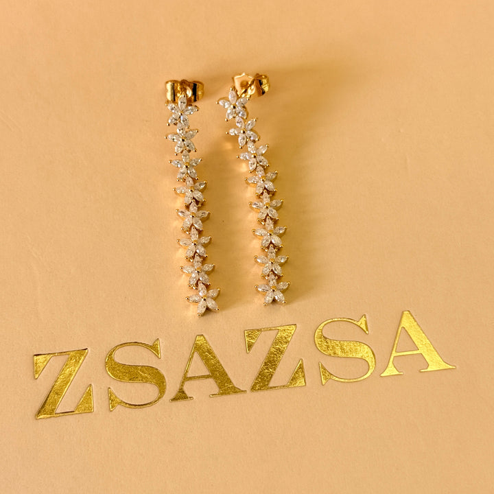 Dainty flowers zircone gold plated earrings and bracelet