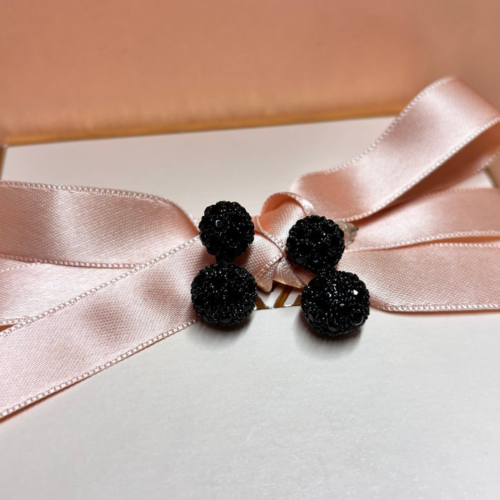 Double ball black earrings