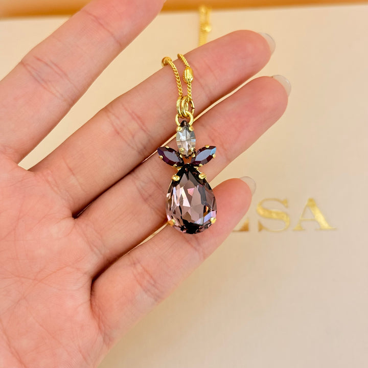 Marquise and teardrop mauve and dark red Swarovski crystals gold plated set