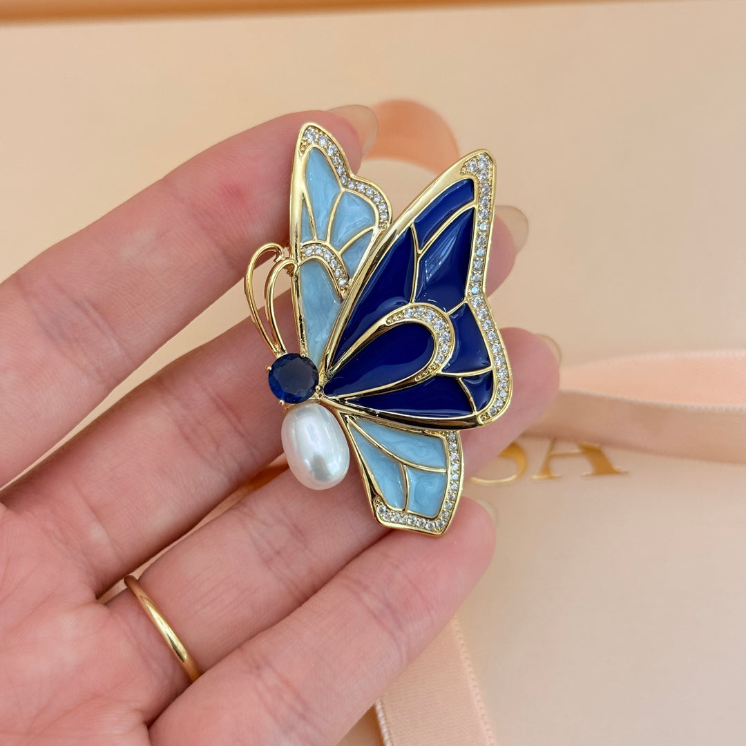 Blue enamel and zircone pearl gold plated brooch