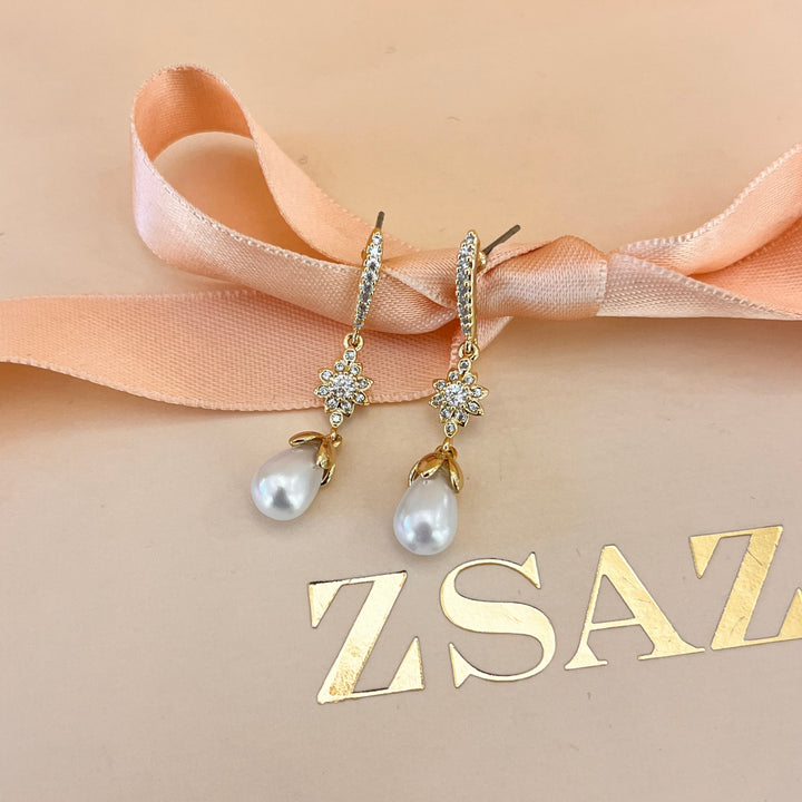 Zircone and white pearl gold plated earrings