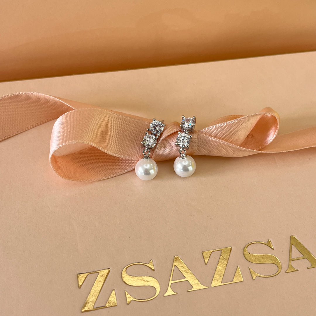 Zircone and white pearls sterling silver set