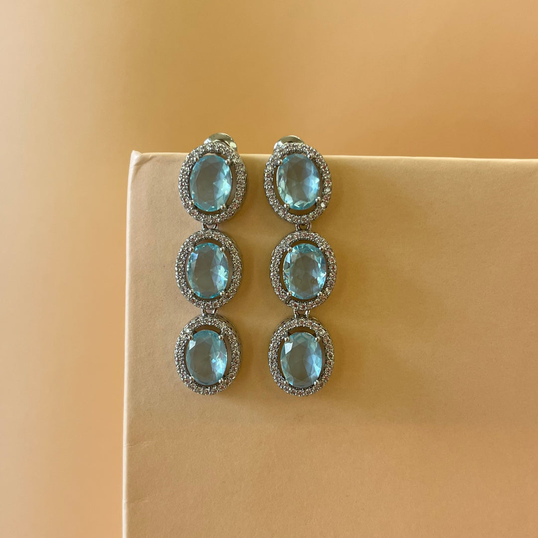 Turquoise oval zircone set