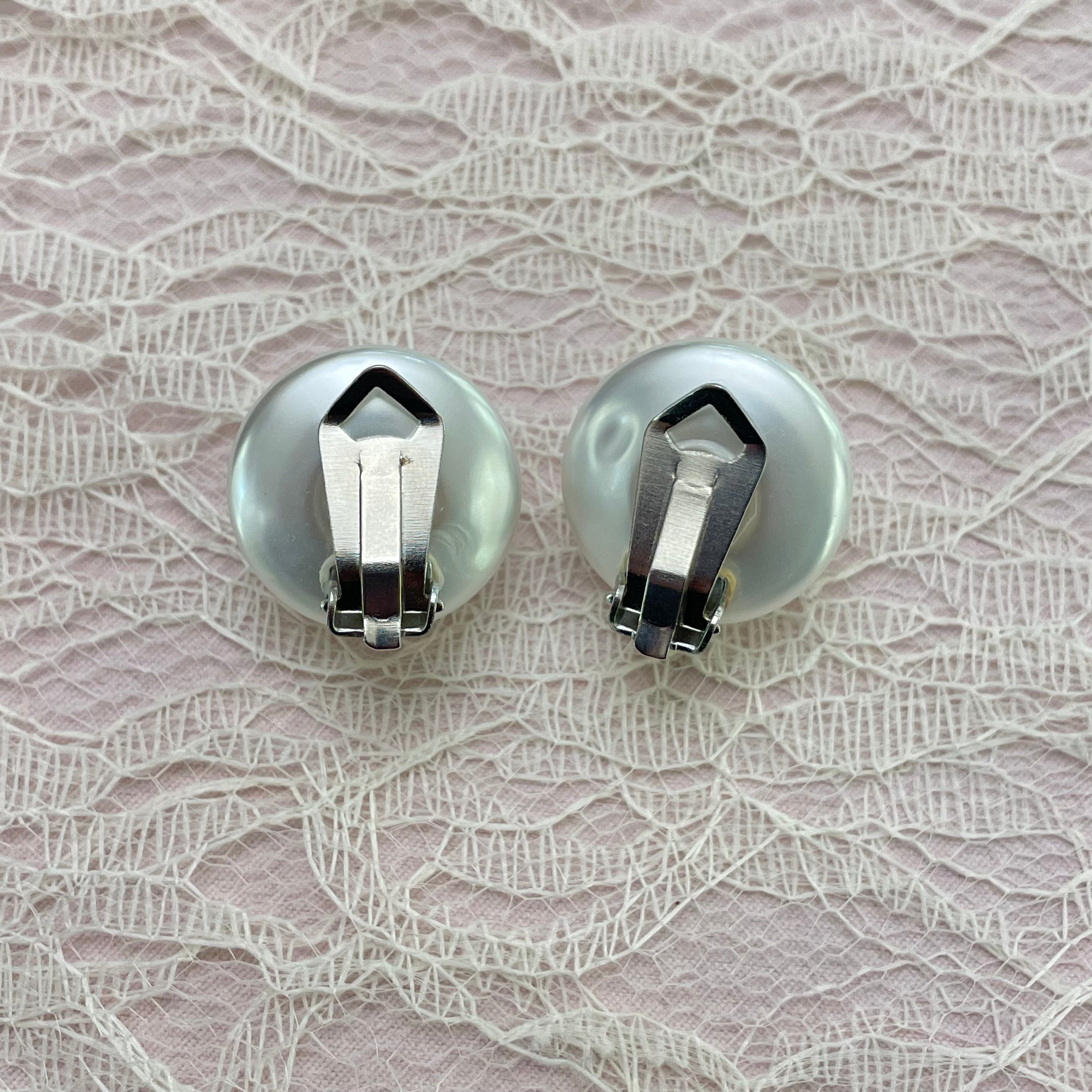 Half ball pearls silver clips earrings