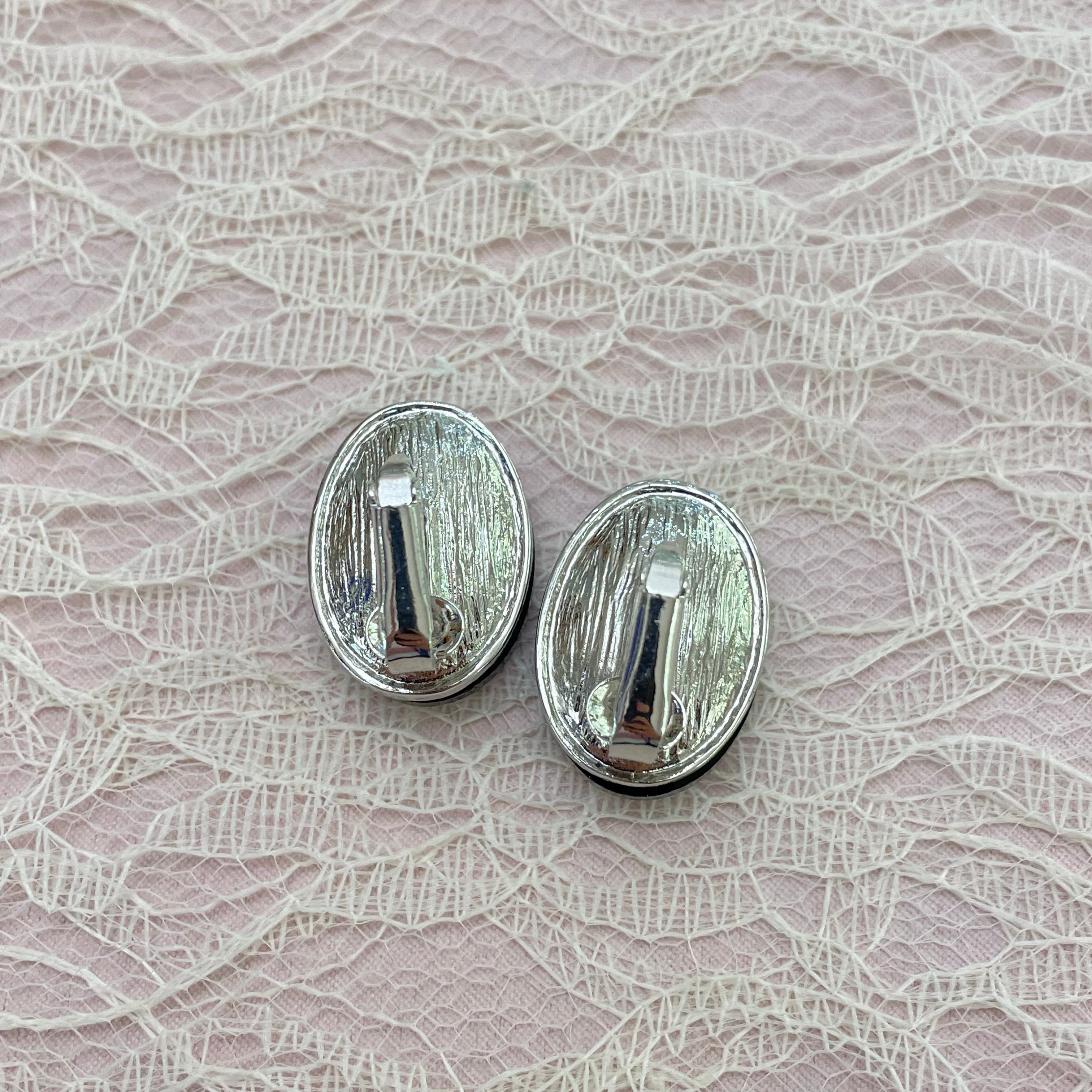 Black oval clips earrings