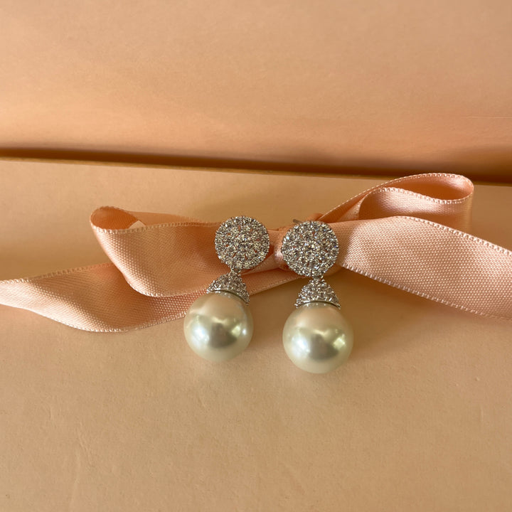 Zicone and white pearls white gold plated earrings