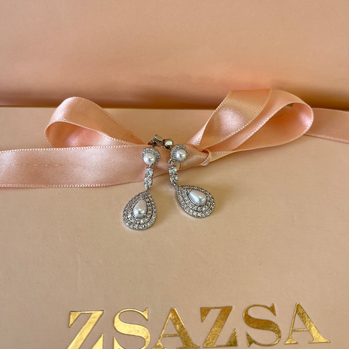 Zircone and white pearls white gold plated earrings