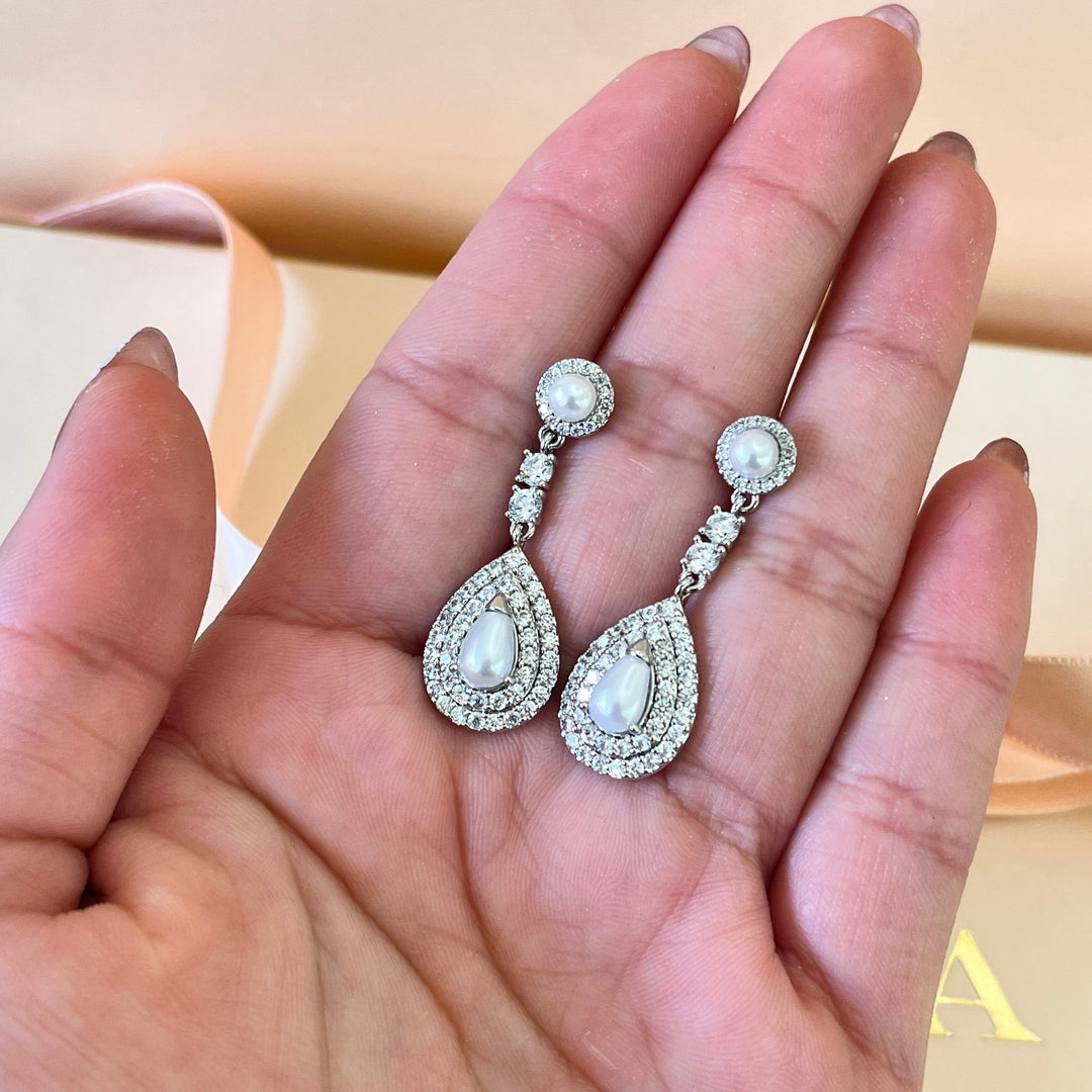 Zircone and white pearls white gold plated earrings