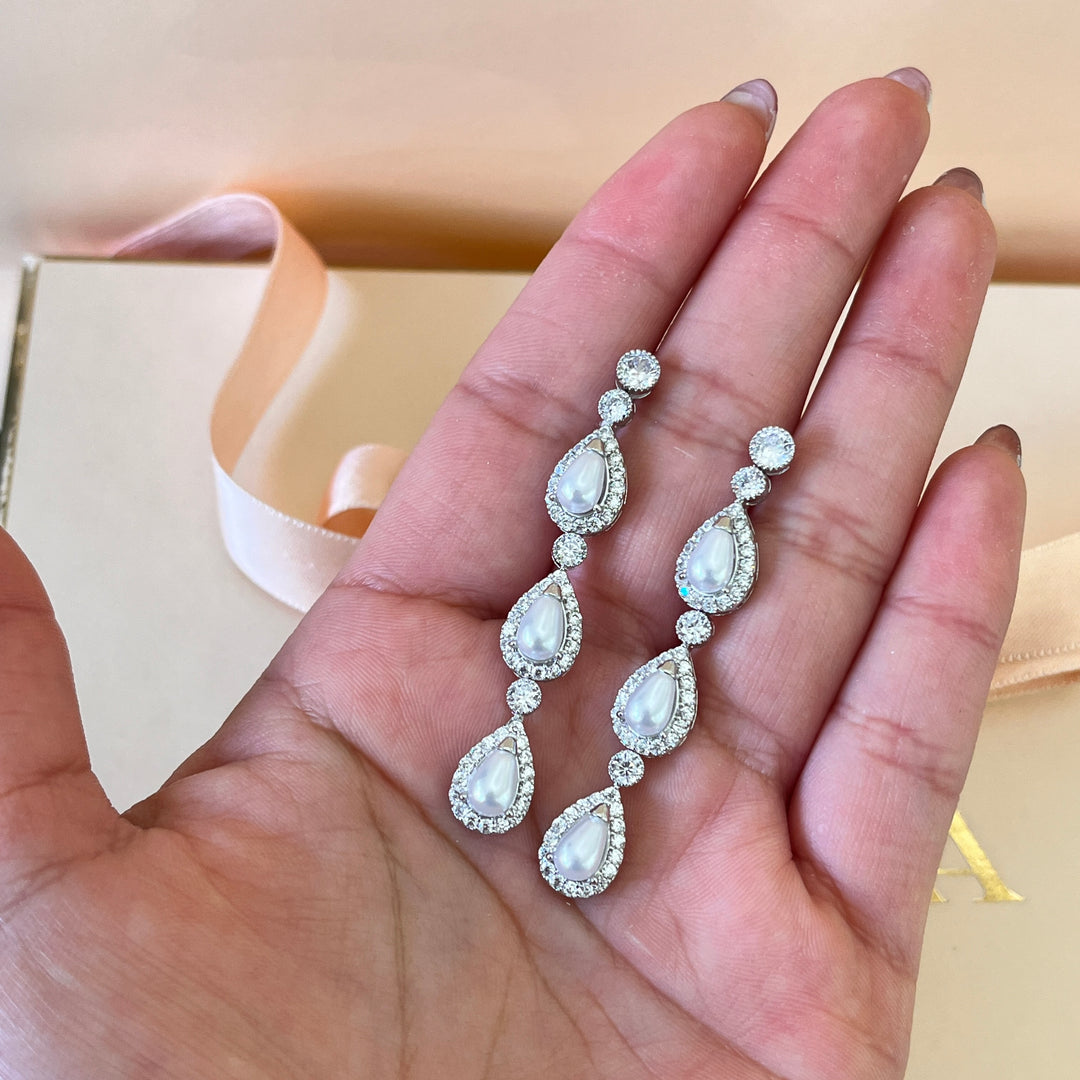 Zircone and teardrop white pearls white gold plated earrings