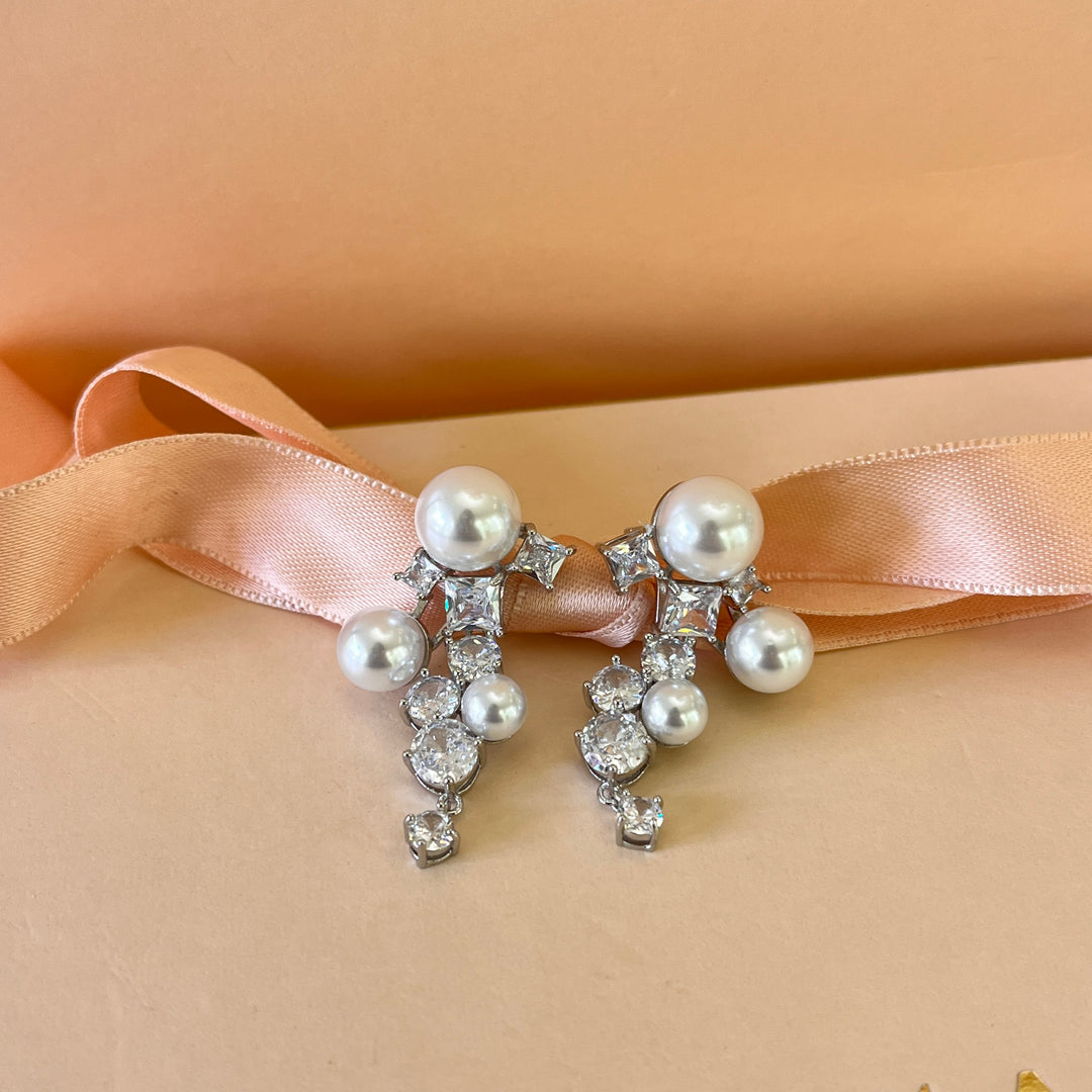 Zircone and white pearls white gold plated earrings