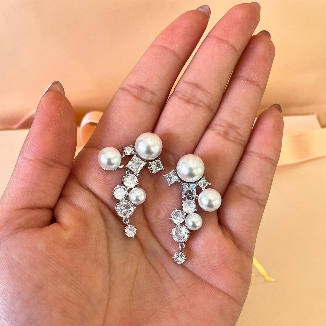 Zircone and white pearls white gold plated earrings