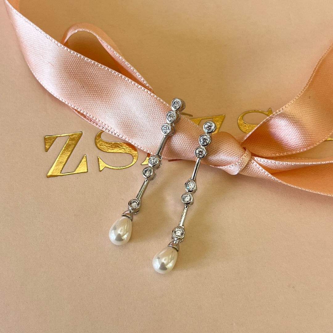 Zircone and white pearl white gold plated earrings
