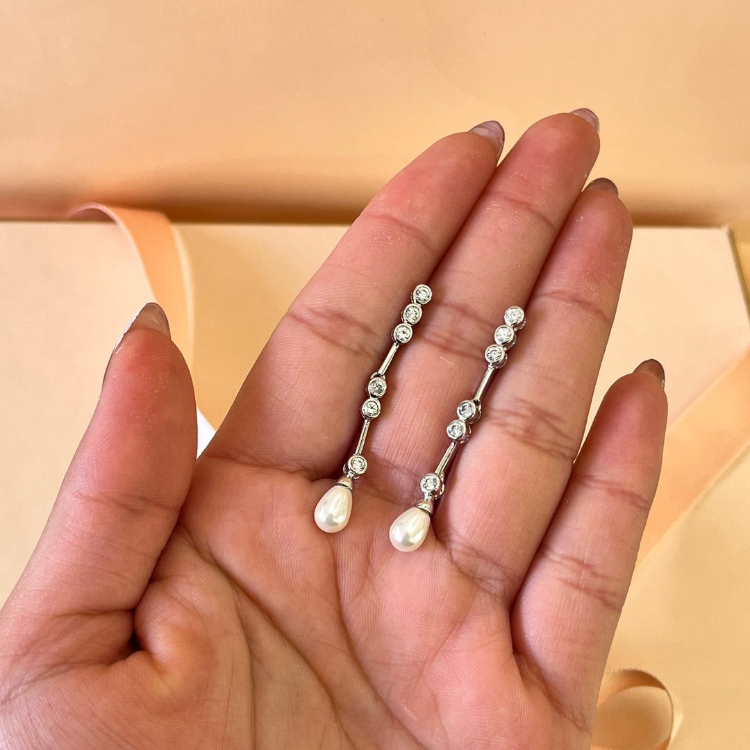Zircone and white pearl white gold plated earrings