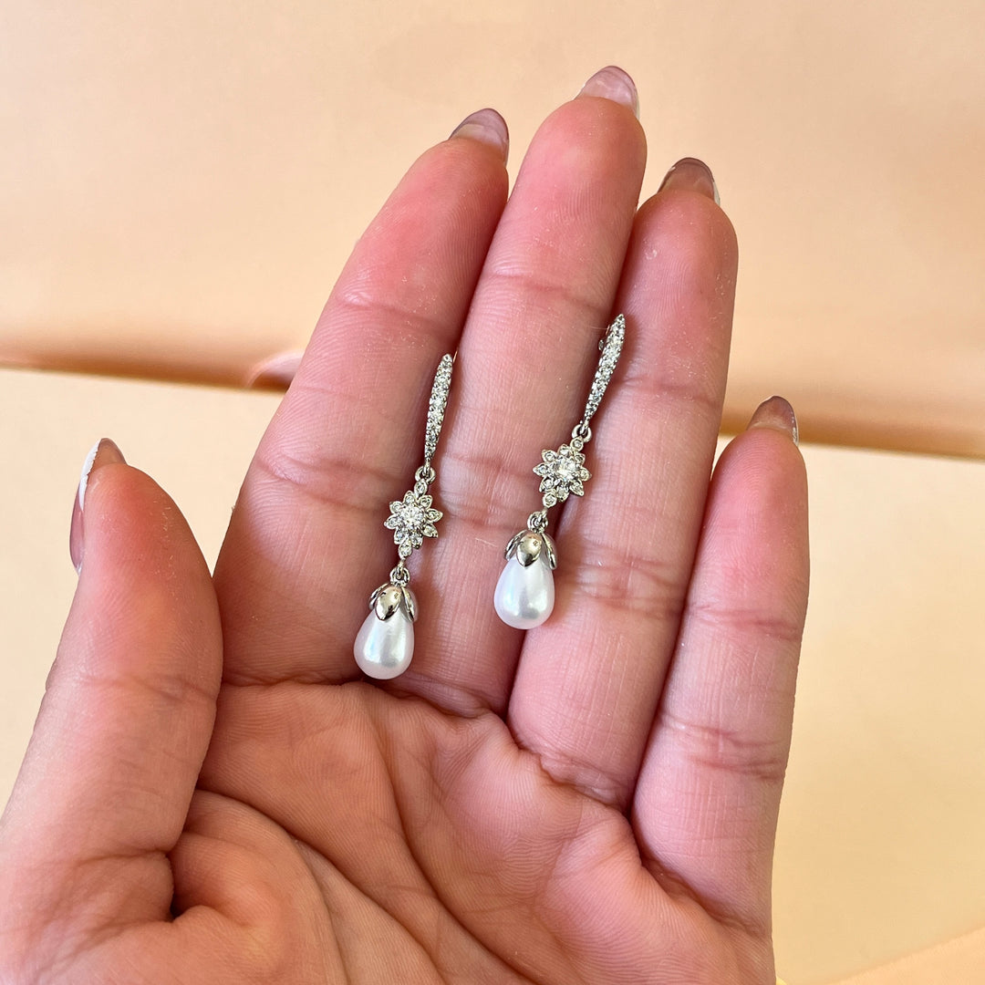 Zircone and white pearl white gold plated earrings