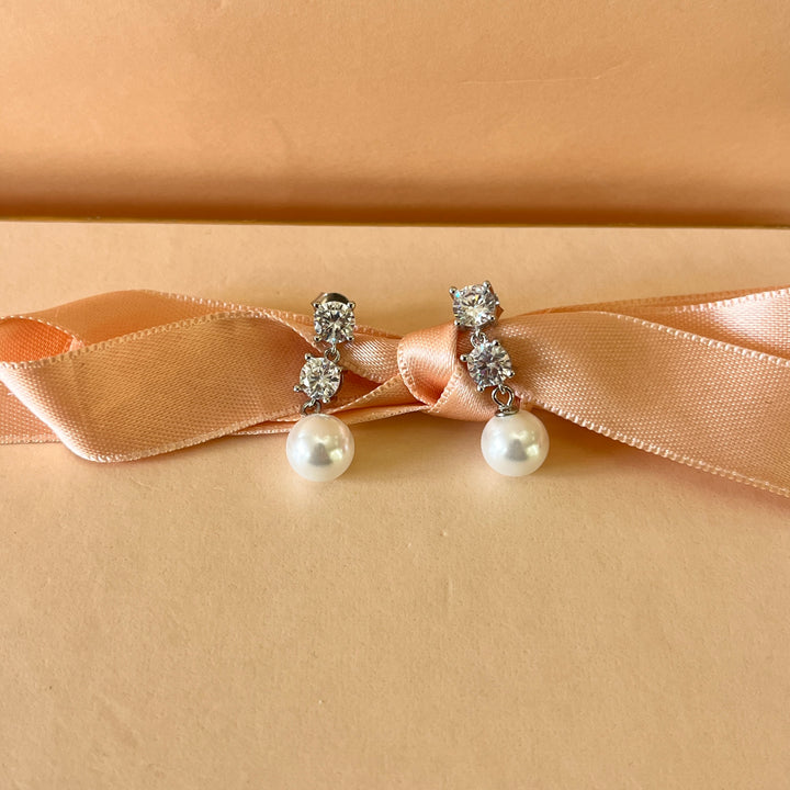 Zircone and white pearls sterling silver set