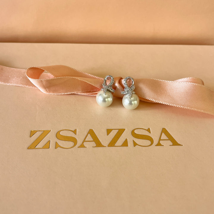 Zircone and white pearls white gold plated studs