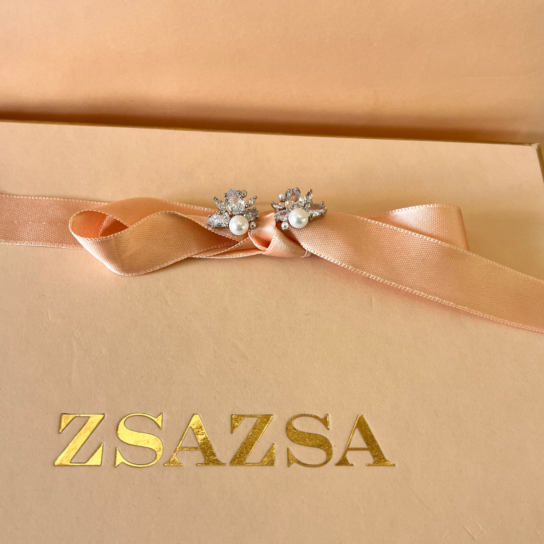 Teardrop and marquise zircone with white pearls white gold plated studs