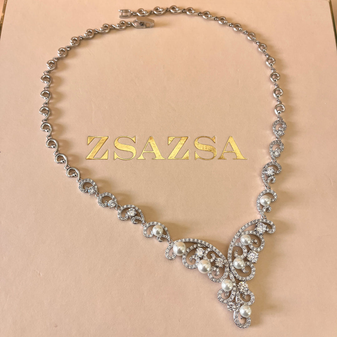 Zircone and white pearls white gold plated set