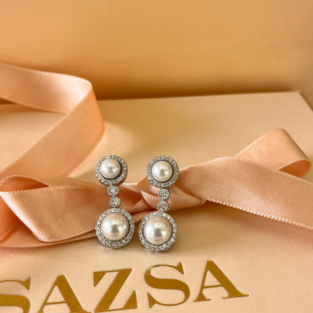 Zircone and white pearls white gold plated round set