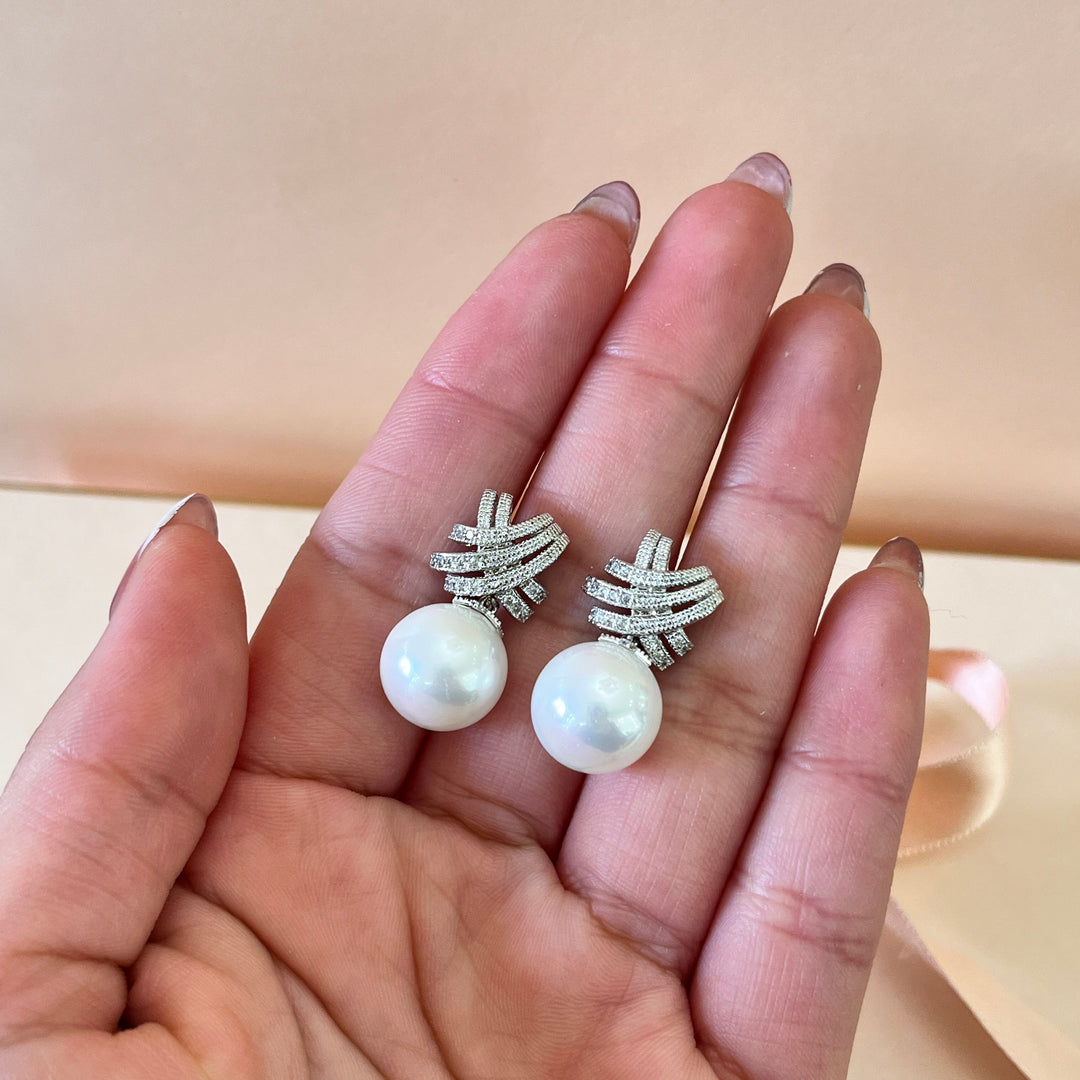 Zircone and white pearls white gold plated studs