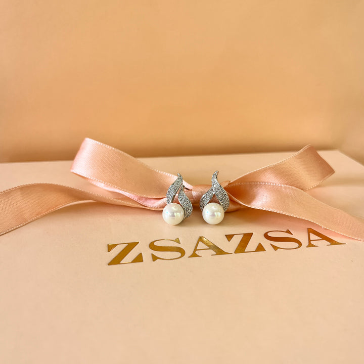Zircone and white pearls white gold plated studs