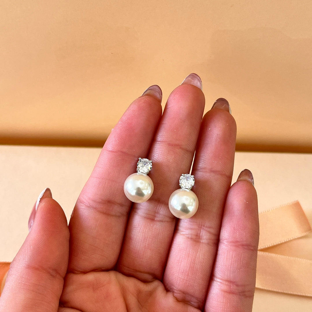 Zircone and ivory pearls white gold plated studs