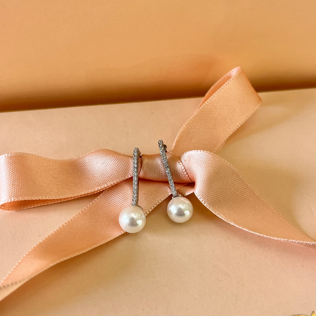 Zircone and white pearls white gold plated earrings