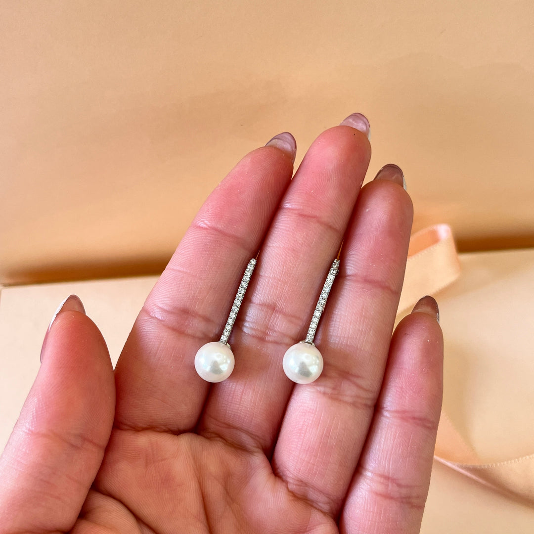 Zircone and white pearls white gold plated earrings