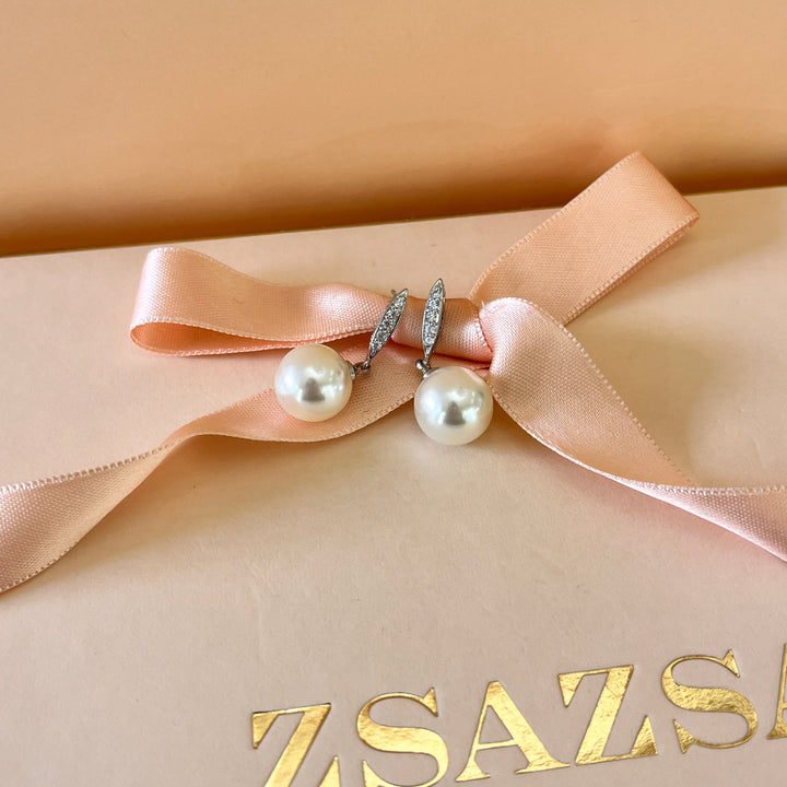 Zircone and ivory pearls white gold plated earrings