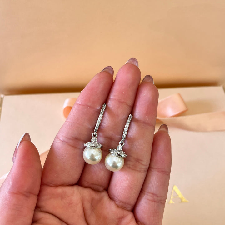Zircone and ivory pearls white gold plated earrings