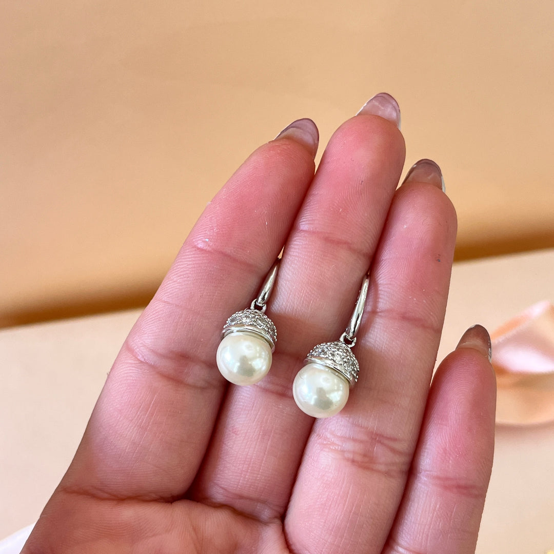 Zircone and ivory pearls white gold plated hooks