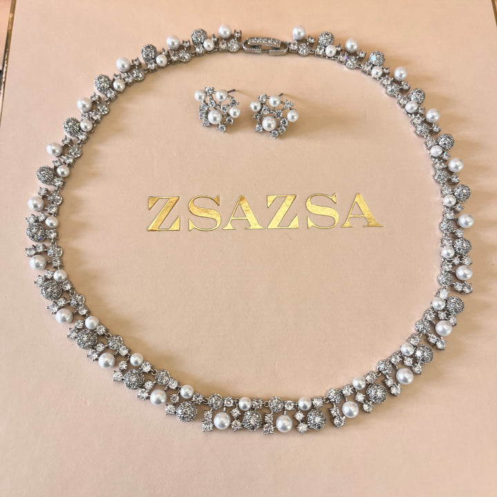 Zircone and white pearls white gold plated set