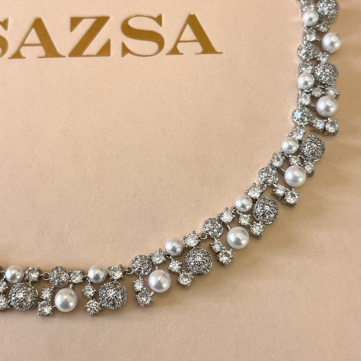 Zircone and white pearls white gold plated set