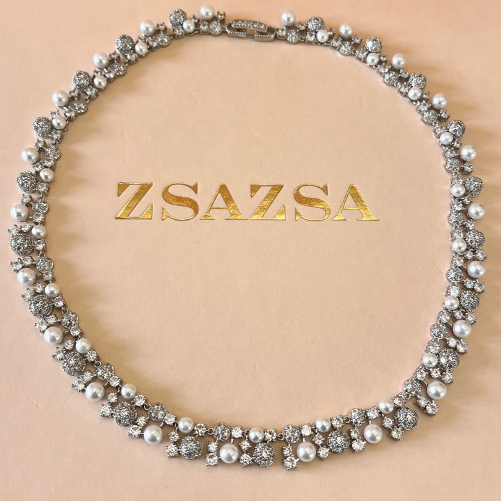 Zircone and white pearls white gold plated set