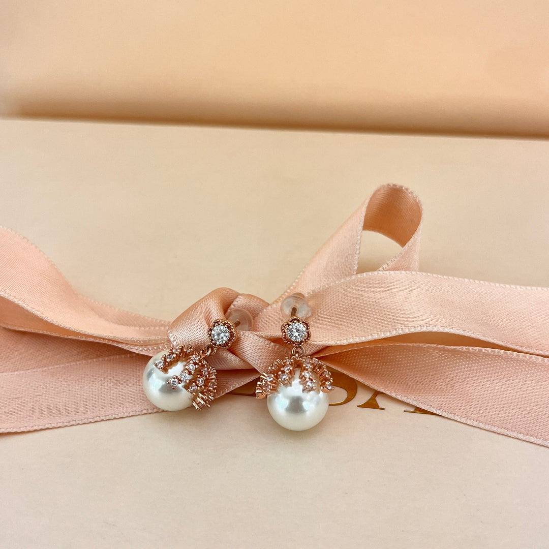 Zircone and white pearls rose gold plated earrings