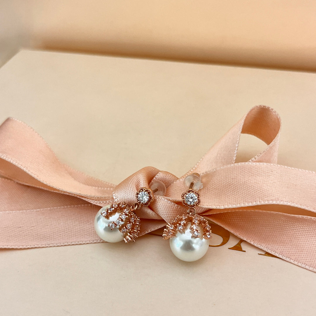 Zircone and white pearls rose gold plated earrings
