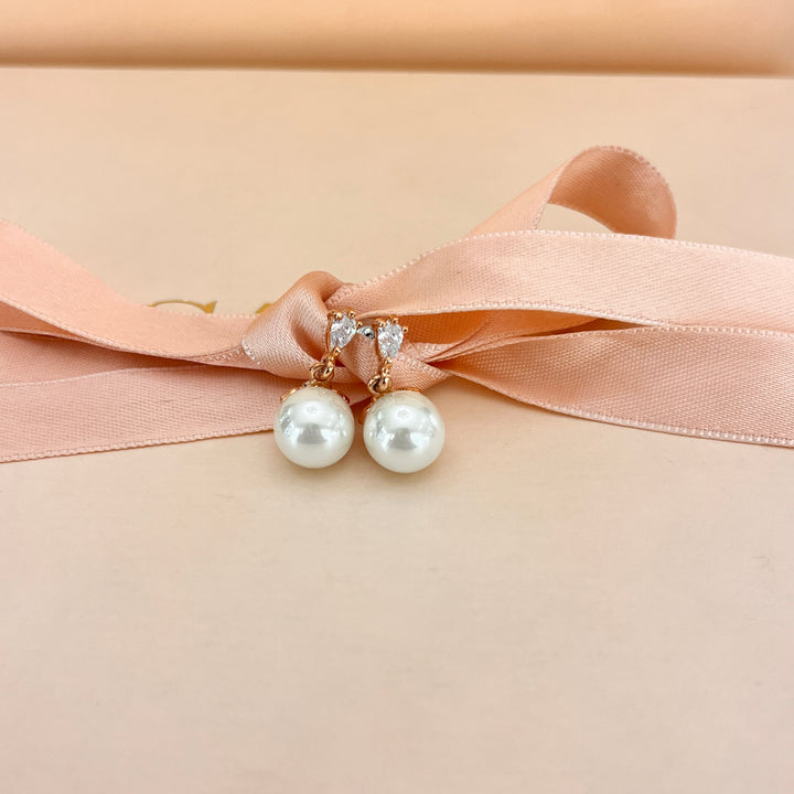 Teardrop zircone and white pearls rose gold plated earrings