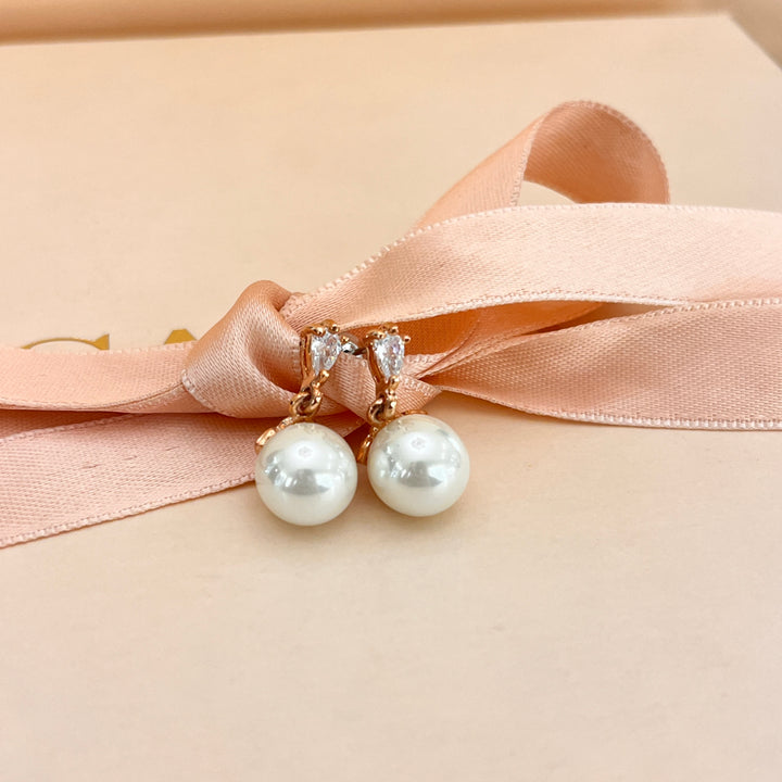 Teardrop zircone and white pearls rose gold plated earrings