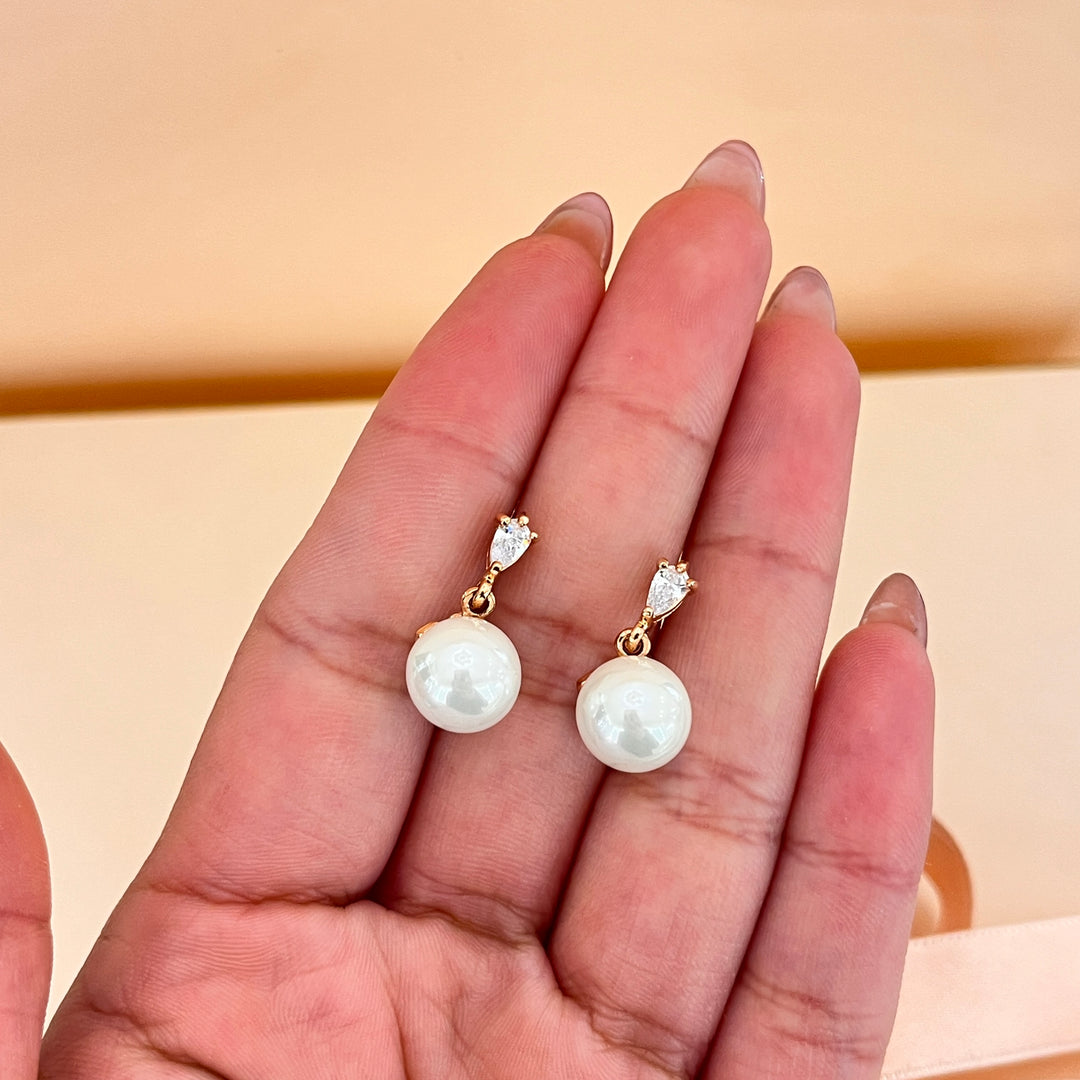 Teardrop zircone and white pearls rose gold plated earrings