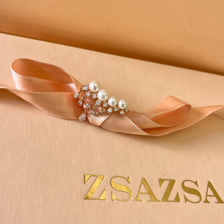 Teardrop zircone and white pearls rose gold plated asymmetrical earrings