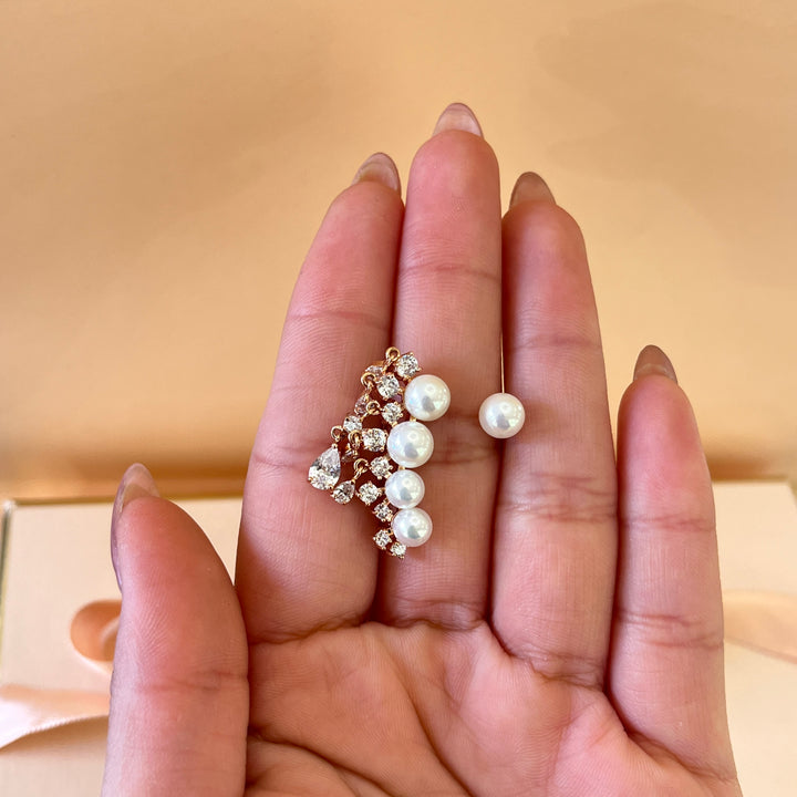 Teardrop zircone and white pearls rose gold plated asymmetrical earrings