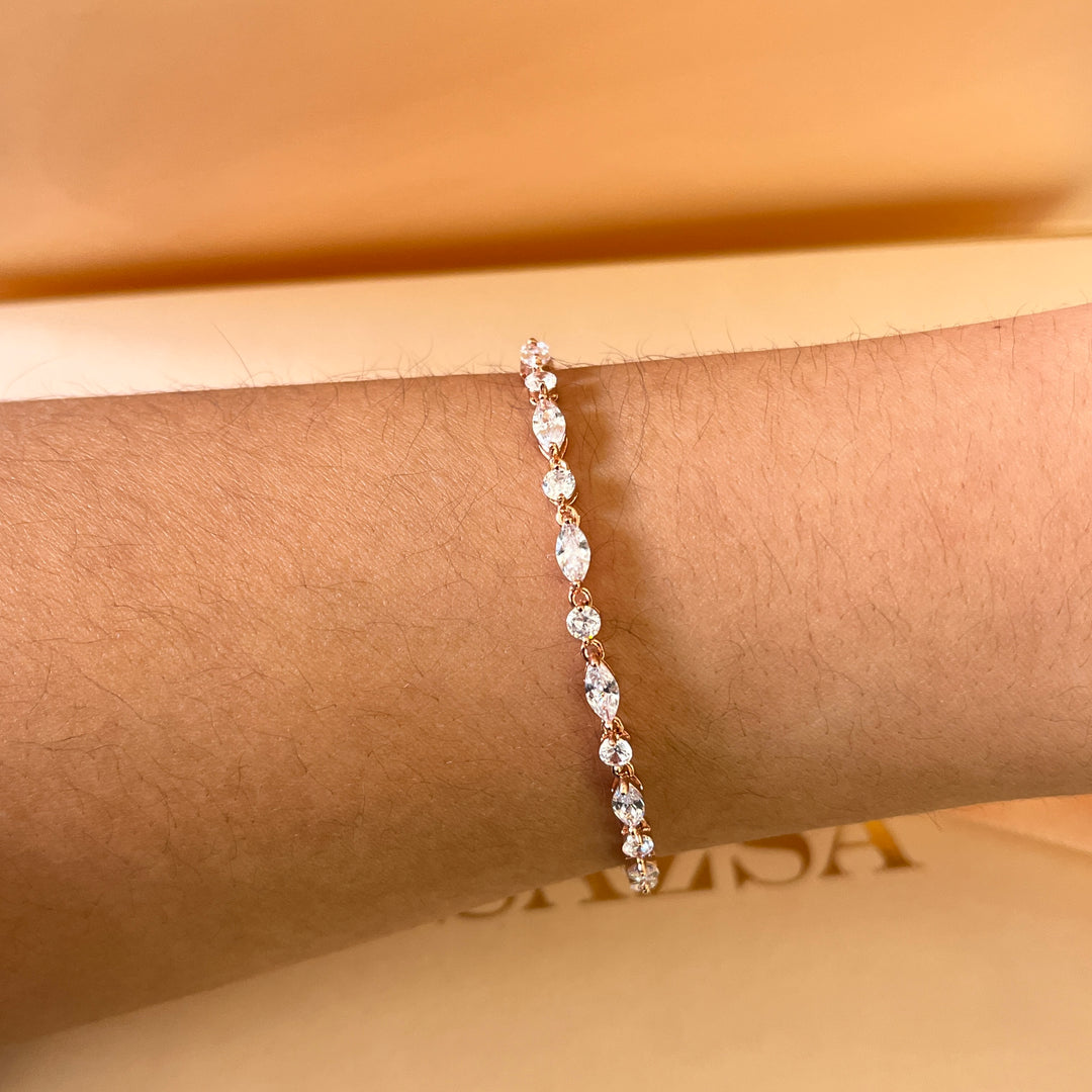 Teardrop and marquise zircone rose gold plated earrings and bracelet