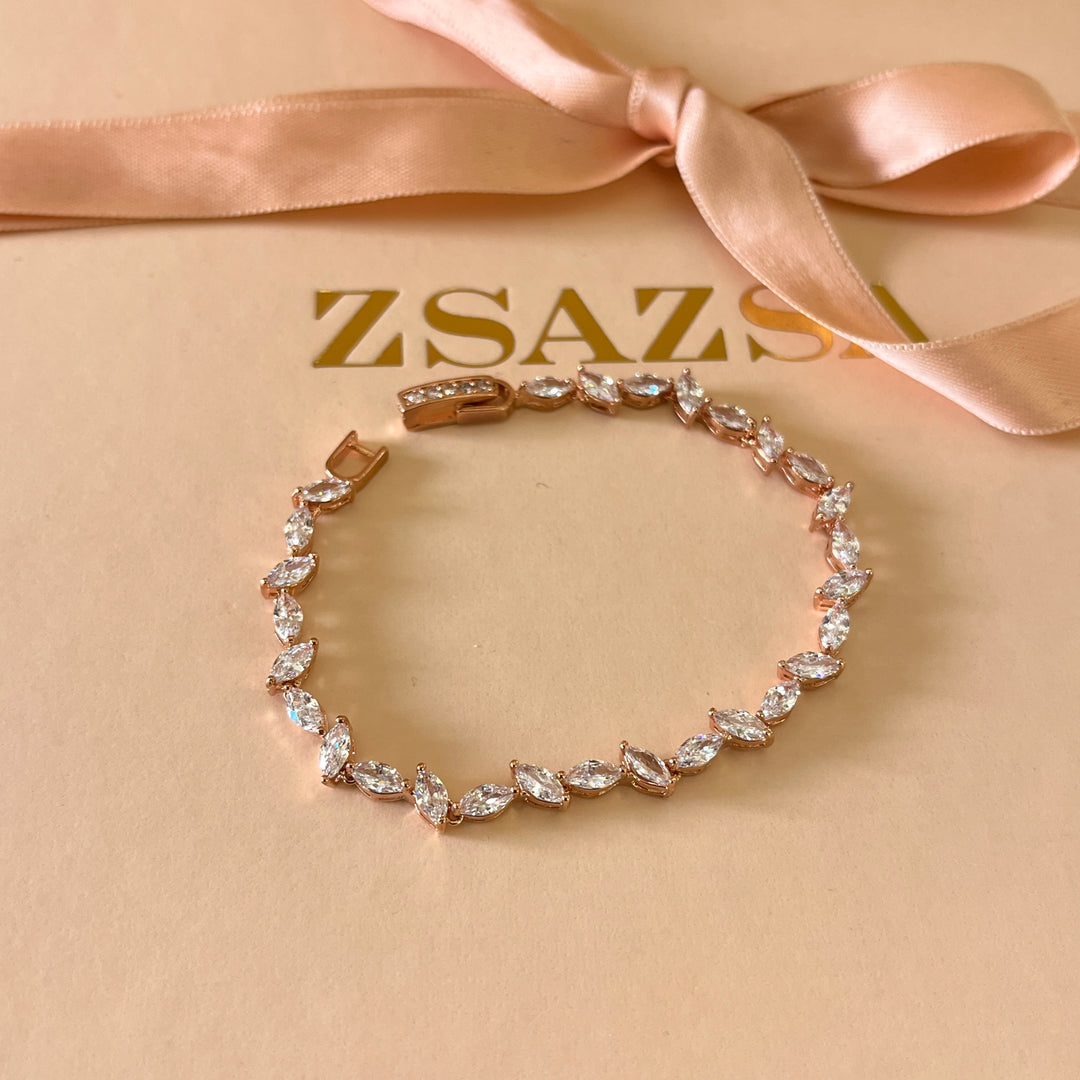Teardrop and marquise zircone rose gold plated earrings and bracelet
