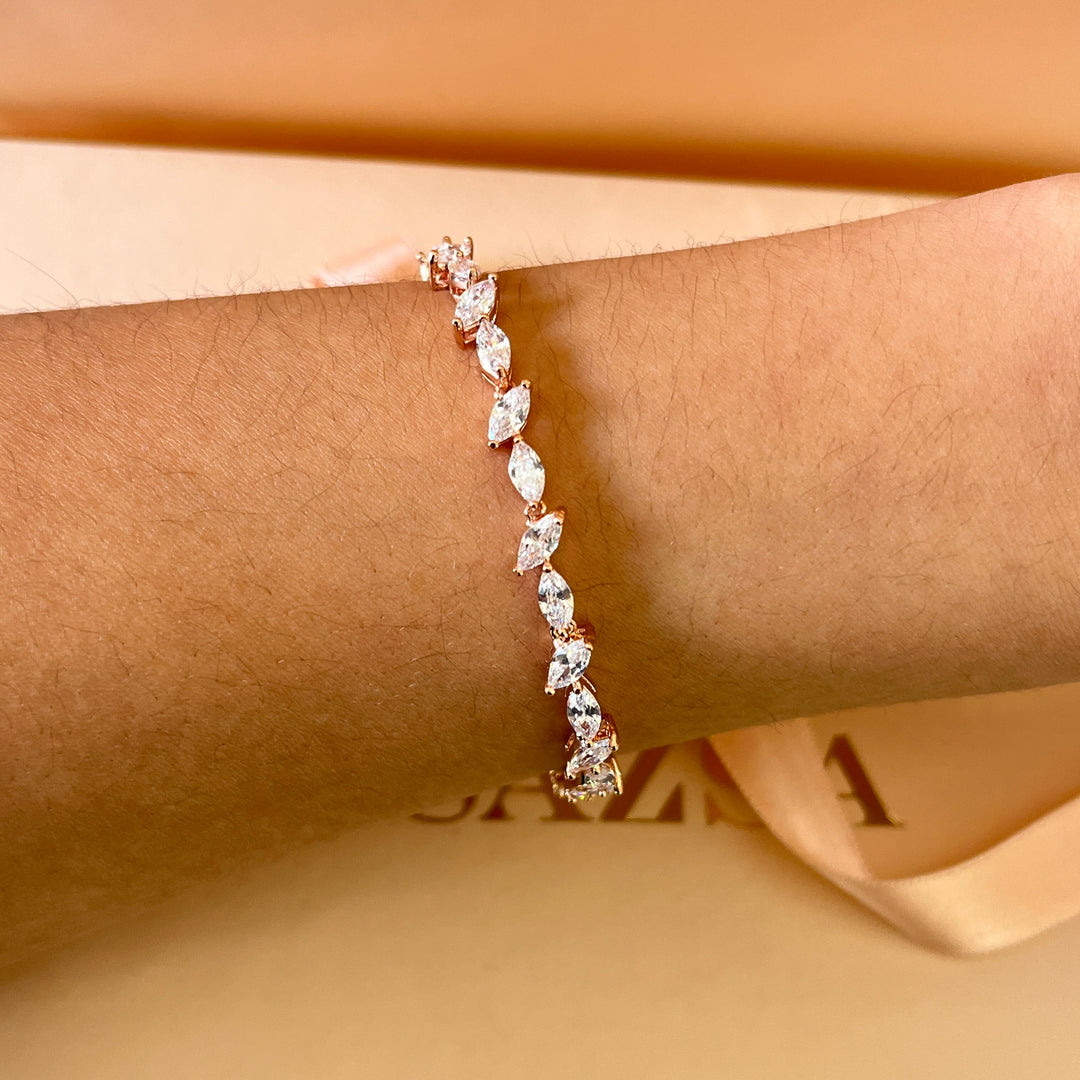 Teardrop and marquise zircone rose gold plated earrings and bracelet