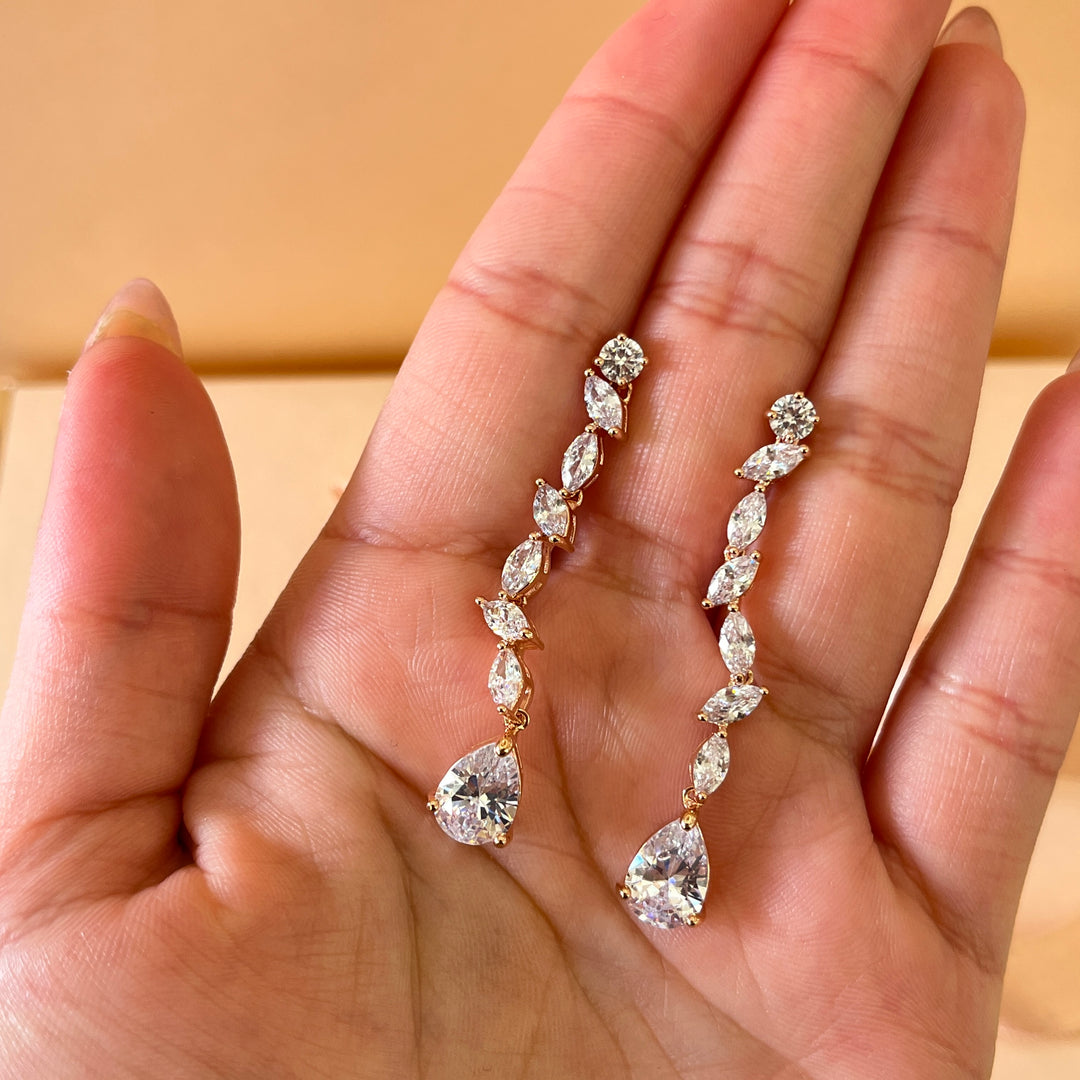 Teardrop and marquise zircone rose gold plated earrings and bracelet