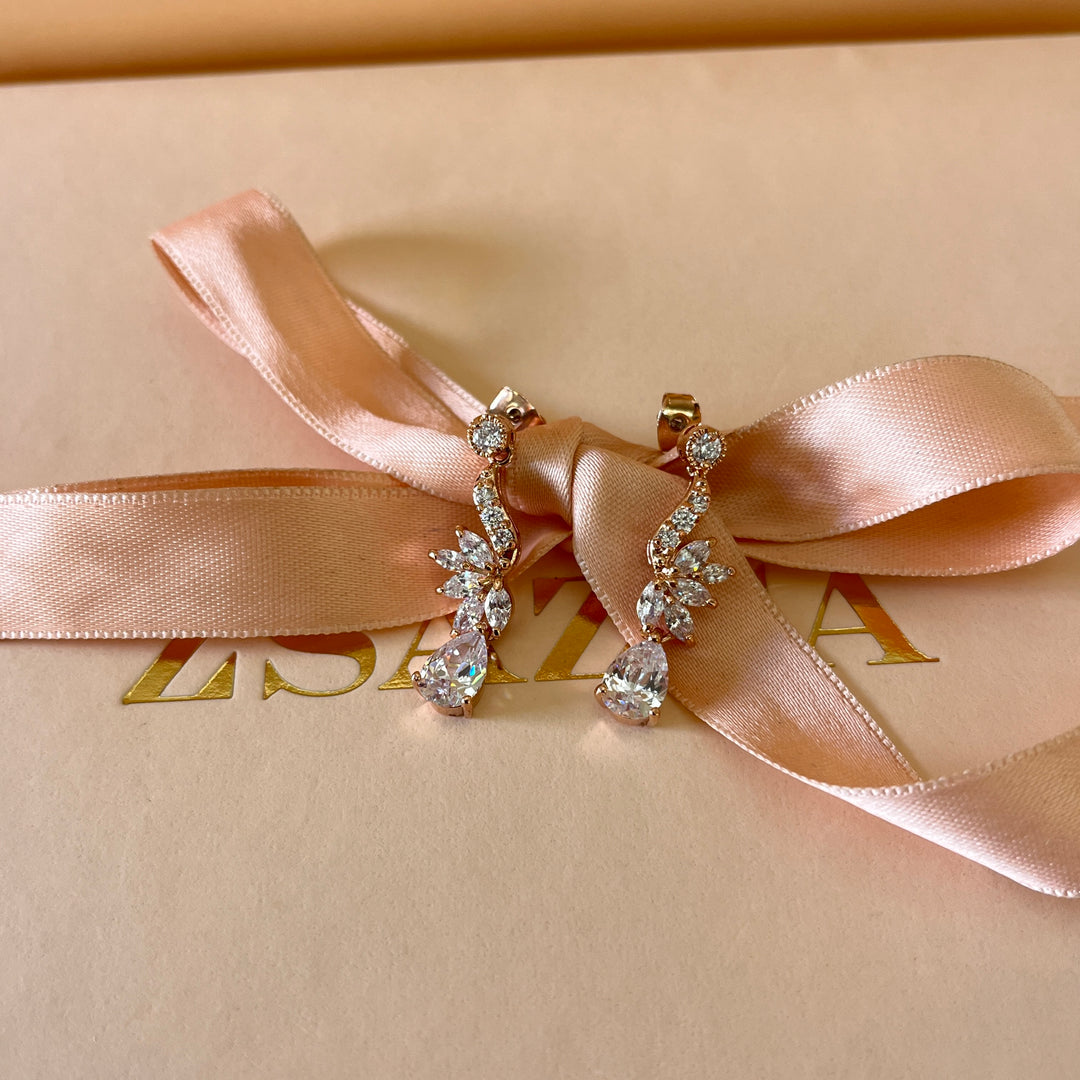 Teardrop and marquise zircone rose gold plated earrings and bracelet