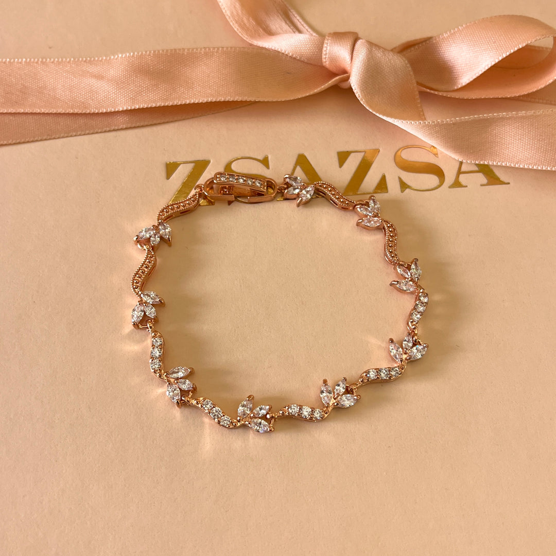 Teardrop and marquise zircone rose gold plated earrings and bracelet