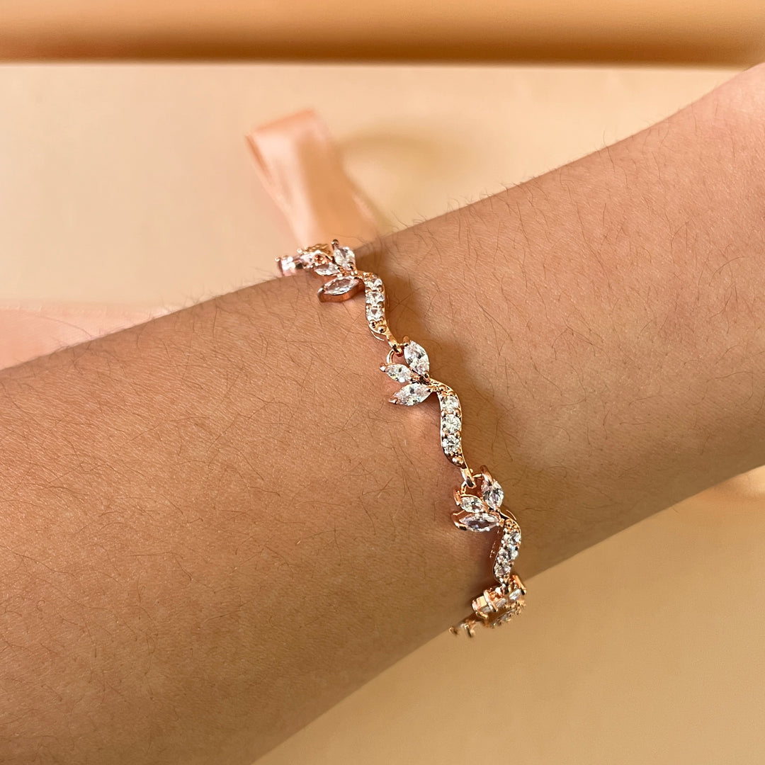 Teardrop and marquise zircone rose gold plated earrings and bracelet