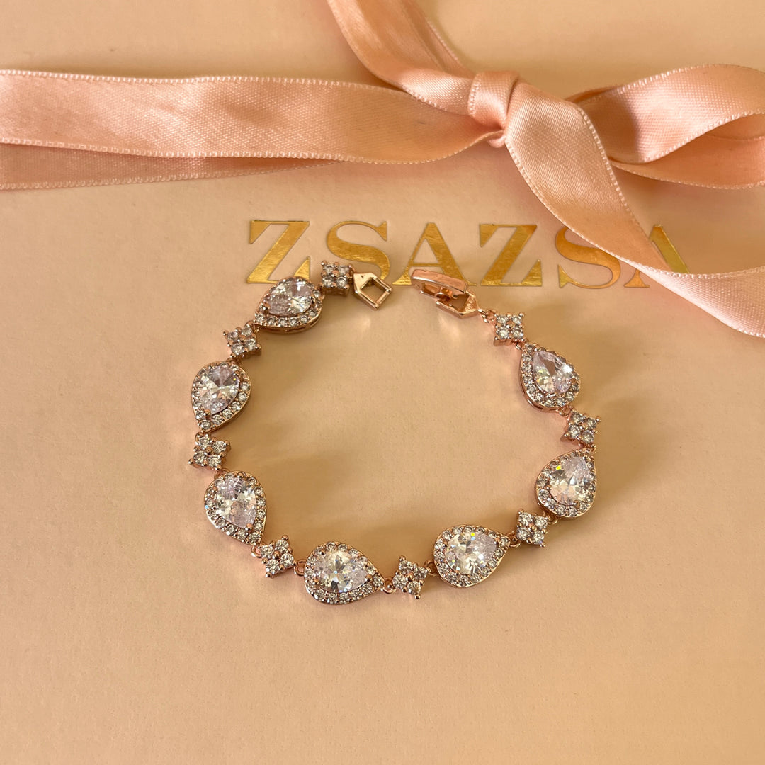Teardrop zircone rose gold plated earrings and bracelet