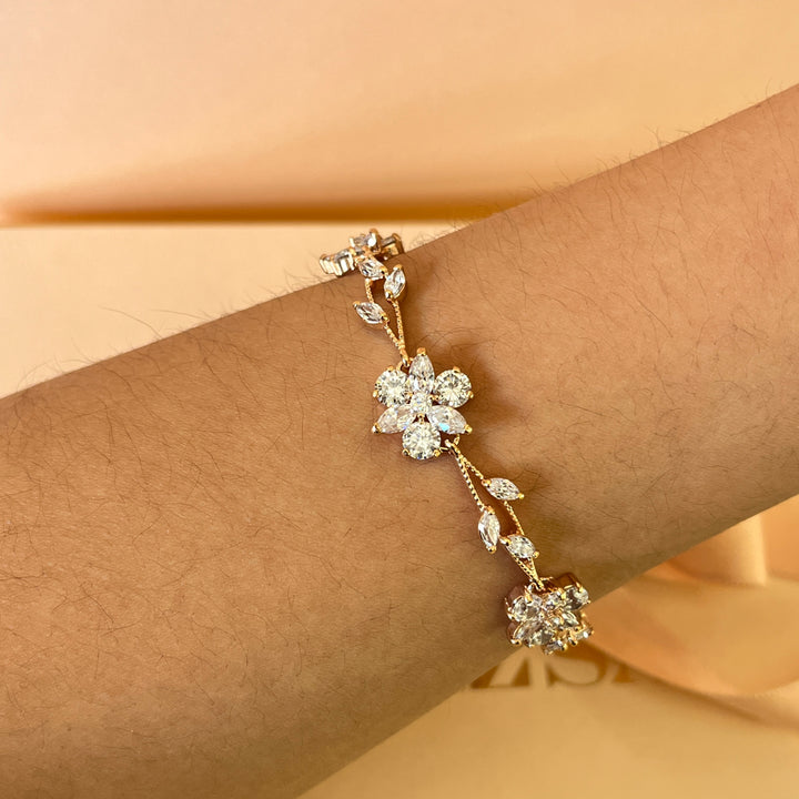 Marquise and round zircone rose gold plated earrings and bracelet